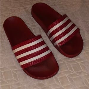 Red adidas slides